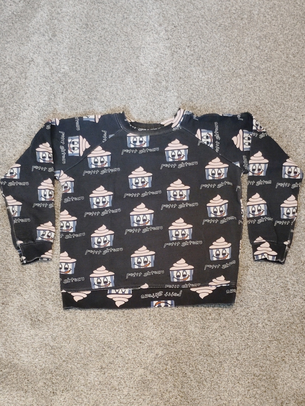 Hugo Loves Tiki Black Sweatshirt with Pink Cupcake Print